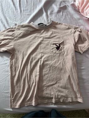 PLAYBOY Men's Short-Sleeve Pocket Tee in Pale Pink with Dark Logo